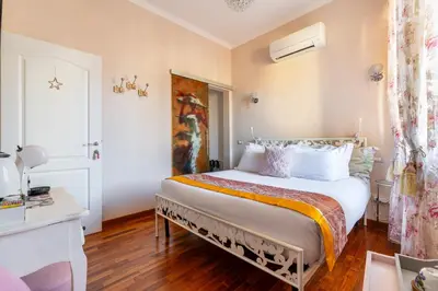 Letto o letti in una camera di Central View Boutique - Milù Holidays Firenze