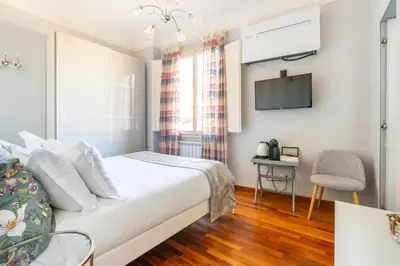 Letto o letti in una camera di Central View Boutique - Milù Holidays Firenze