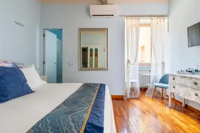 Letto o letti in una camera di Central View Boutique - Milù Holidays Firenze