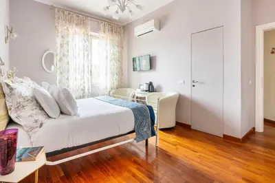 Letto o letti in una camera di Central View Boutique - Milù Holidays Firenze