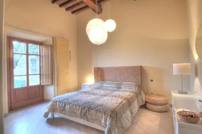 Letto o letti in una camera di Agriturismo Il Poderaccio