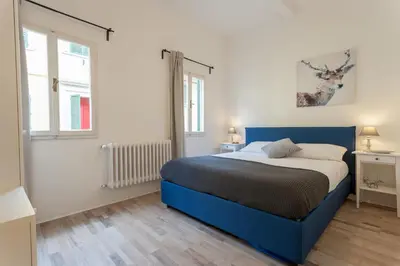 Letto o letti in una camera di Casa Cosi - Sant Ambrogio