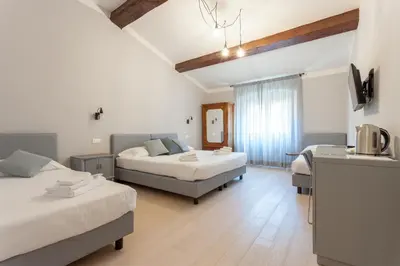 Letto o letti in una camera di Santo Spirito Venti