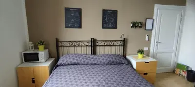 Letto o letti in una camera di Casa Lambruschini
