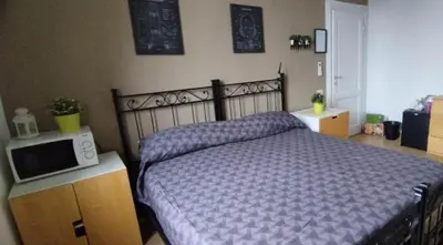 Letto o letti in una camera di Casa Lambruschini