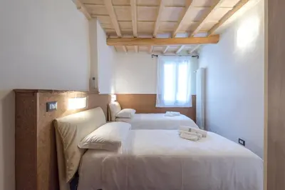 Letto o letti in una camera di Il Limone