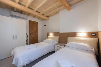 Letto o letti in una camera di Il Limone