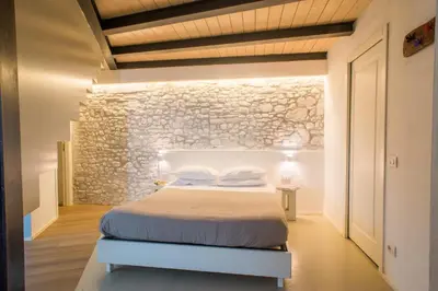 Letto o letti in una camera di Villa Aruch