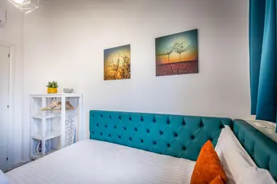 Letto o letti in una camera di Central View Apartment