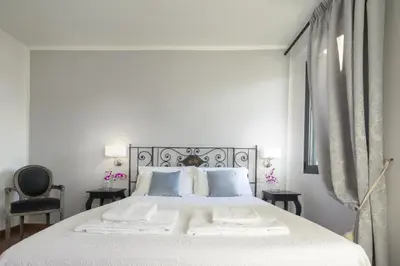 Letto o letti in una camera di Pitti Luxury Terrace by Mmega