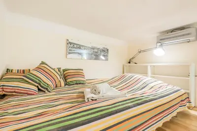 Letto o letti in una camera di Piazza Signoria 1, apartment