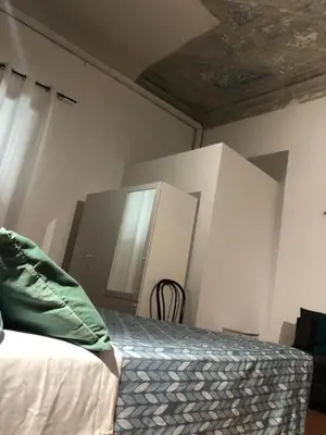 Letto o letti in una camera di Relais Florence