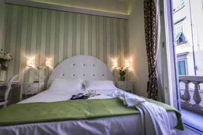 Letto o letti in una camera di Boutique Hotel La Casa di Morfeo