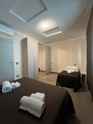 Letto o letti in una camera di Appartamenti la Piazzetta vicino a Firenze