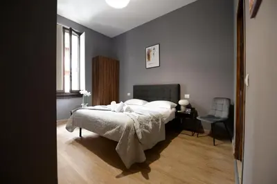 Letto o letti in una camera di Palazzo Oliveto