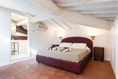 Letto o letti in una camera di Giotto City Center