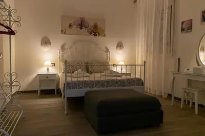 Letto o letti in una camera di Lorenzo Apartment