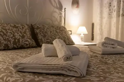 Letto o letti in una camera di Lorenzo Apartment