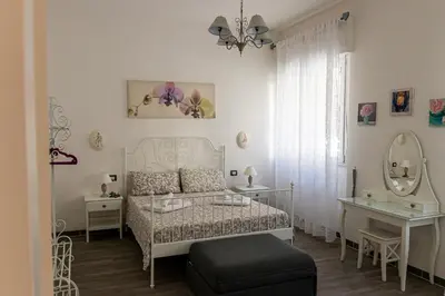 Letto o letti in una camera di Lorenzo Apartment