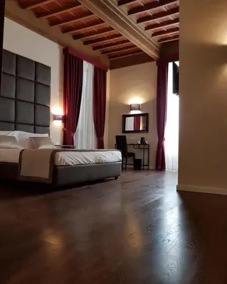 Letto o letti in una camera di 1suite firenze