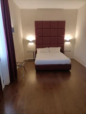 Letto o letti in una camera di 1suite firenze
