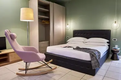 Letto o letti in una camera di Residence Leopoldo
