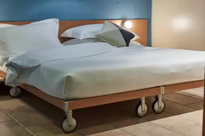 Letto o letti in una camera di Residence Leopoldo