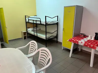 Letto o letti in una camera di Camping Village Il Poggetto