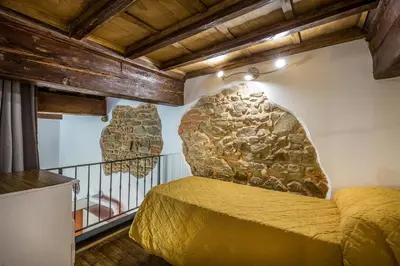 Letto o letti in una camera di Loft Vivi il Cuore di Firenze