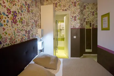 Letto o letti in una camera di Hotel Bencidormi