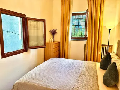 Letto o letti in una camera di Perfect Location In Center