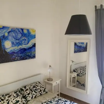 Letto o letti in una camera di La casetta dipinta