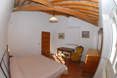 Letto o letti in una camera di Agriturismo I Poggi