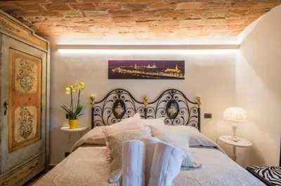 Letto o letti in una camera di Florence Luxury House
