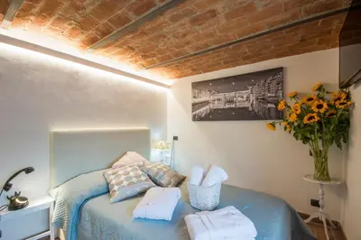 Letto o letti in una camera di Florence Luxury House