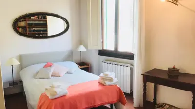 Letto o letti in una camera di Gino's place