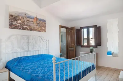 Letto o letti in una camera di La Terrazza di San Lorenzo