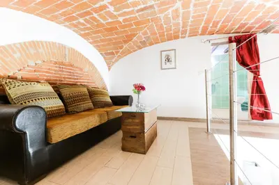Area soggiorno di Florence Fortezza Apartment