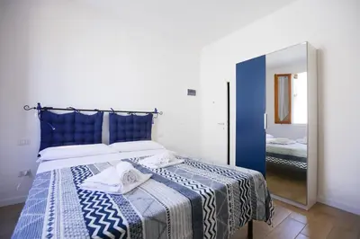 Letto o letti in una camera di Florence San Marco Apartment