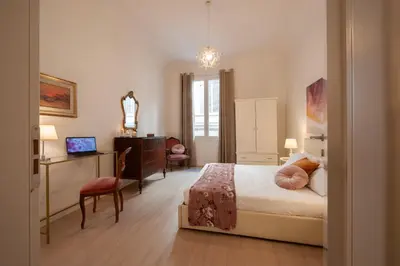 Letto o letti in una camera di Bargello - Flo Apartments