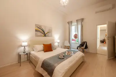 Letto o letti in una camera di Bargello - Flo Apartments