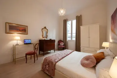Letto o letti in una camera di Bargello - Flo Apartments