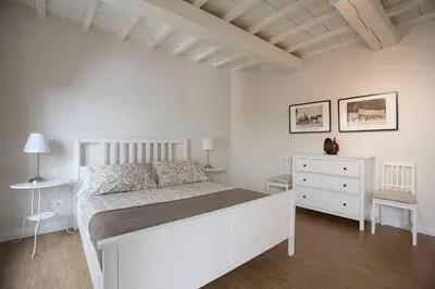 Letto o letti in una camera di Maffia Luxury