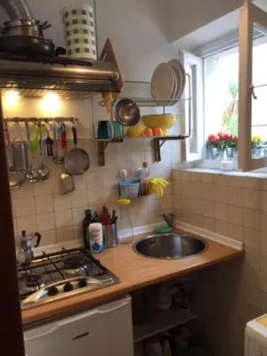 Cucina o angolo cottura di VOLTA DEI TINTORI APT. RIVER VIEW WIFI TV