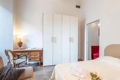 Letto o letti in una camera di Palazzo Vecchio Apartments by Mmega