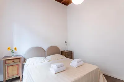 Letto o letti in una camera di Palazzo Vecchio Apartments by Mmega