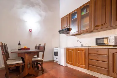 Cucina o angolo cottura di Palazzo Vecchio Apartments by Mmega