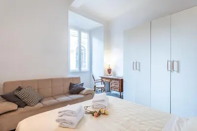 Letto o letti in una camera di Palazzo Vecchio Apartments by Mmega