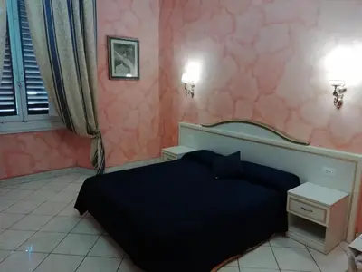 Letto o letti in una camera di La Corte Dei Principi - Residenza D'Epoca