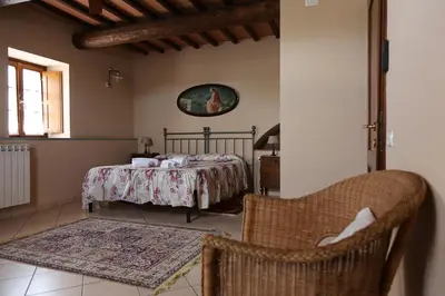 Letto o letti in una camera di Agriturismo Villani Poderi Nesti & Cupoli